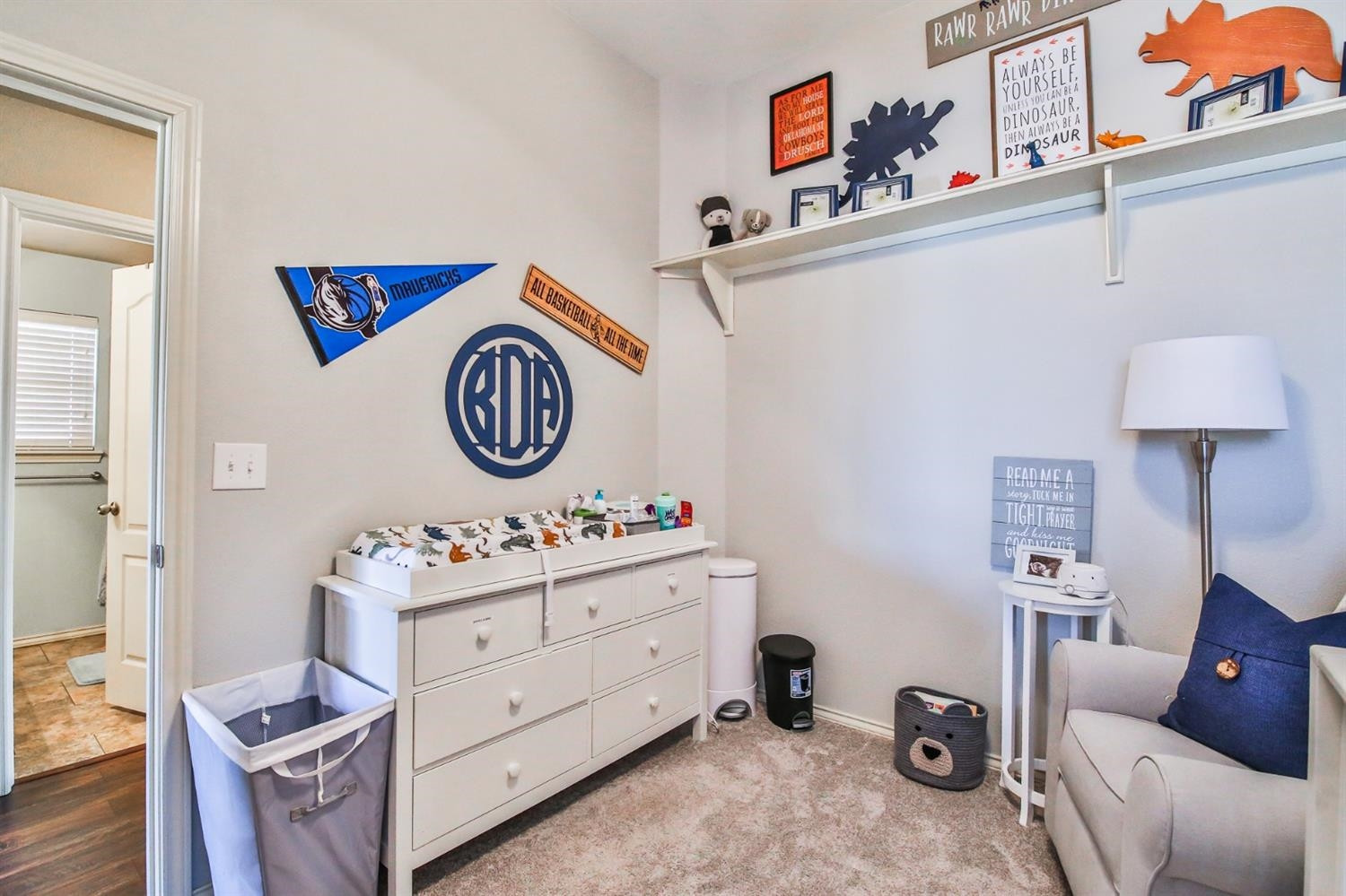 6205 101st Place Lubbock, TX 79424 - Photo 29 of 37 a bedroom with a bed and cabinets