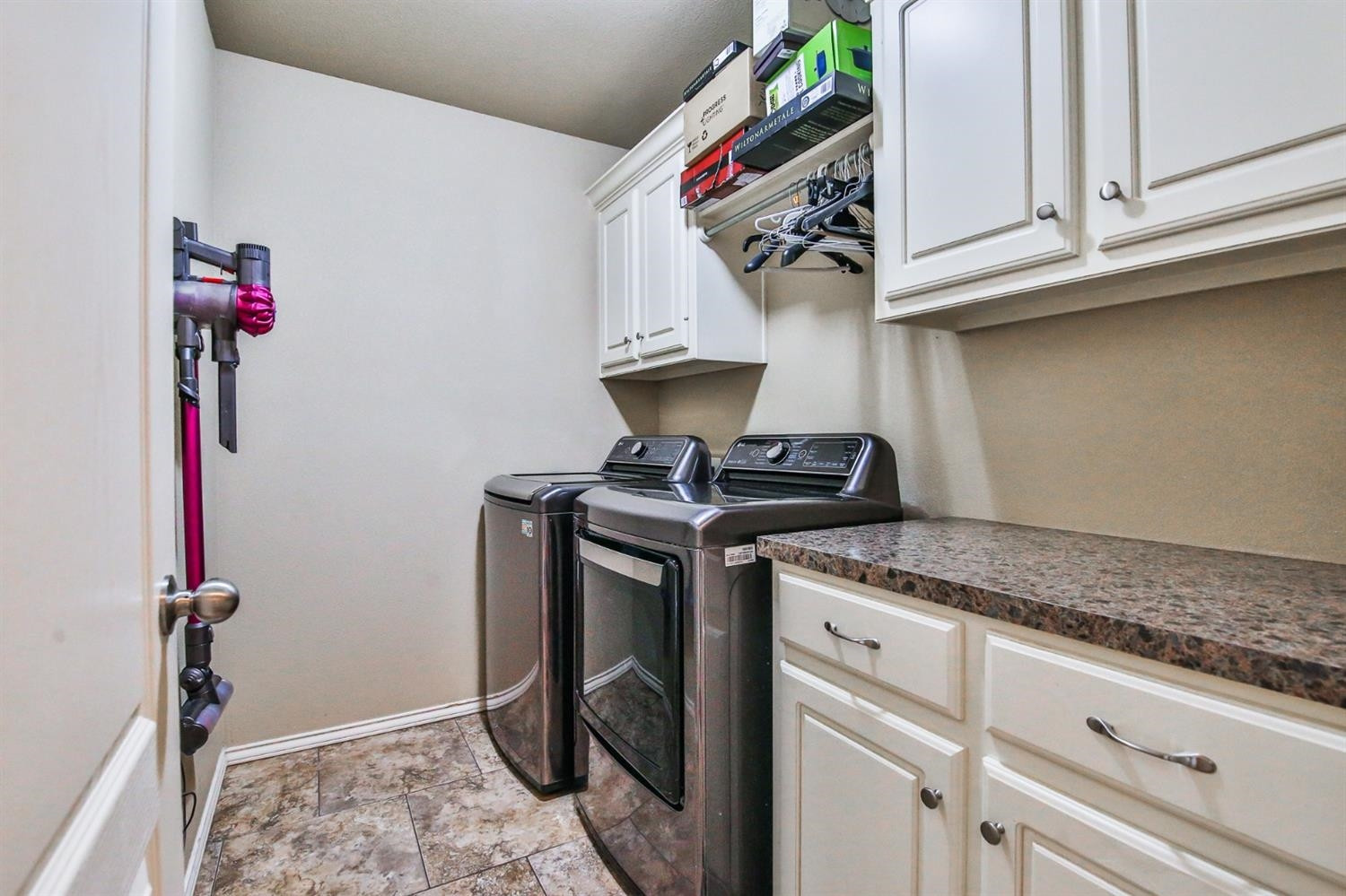 6205 101st Place Lubbock, TX 79424 - Photo 32 of 37 a utility room with dryer and washer