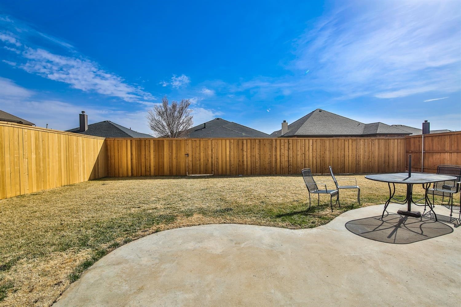 6205 101st Place Lubbock, TX 79424 - Photo 34 of 37 a swimming pool with wooden fence