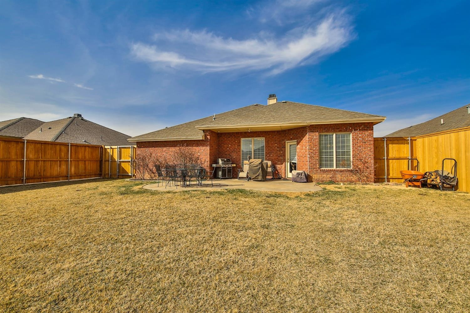 6205 101st Place Lubbock, TX 79424 - Photo 37 of 37 a front view of a house with a yard