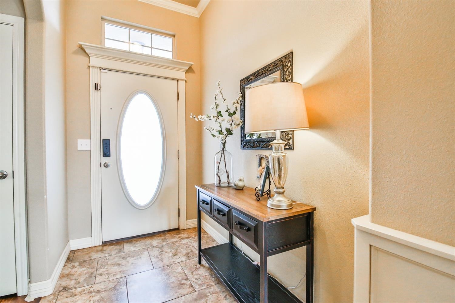 6205 101st Place Lubbock, TX 79424 - Photo 5 of 37 a room with a mirror and a sink