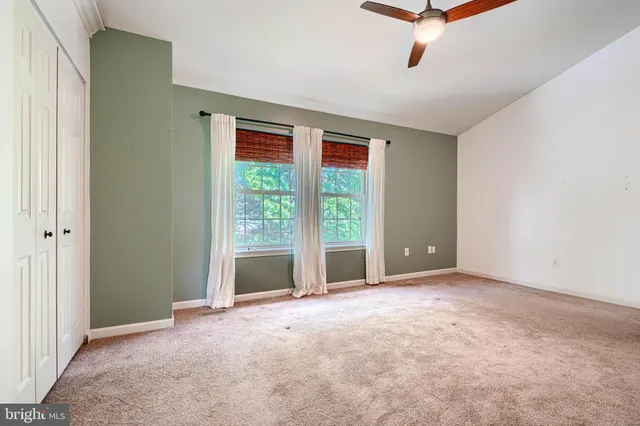 an empty room with windows