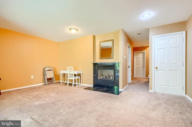 a view of a livingroom with a fireplace