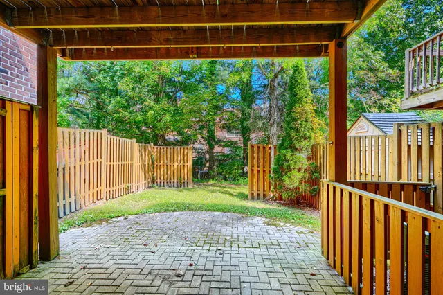 a view of front door of house with a street