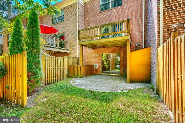 a bathroom with a toilet sink shower and mirror