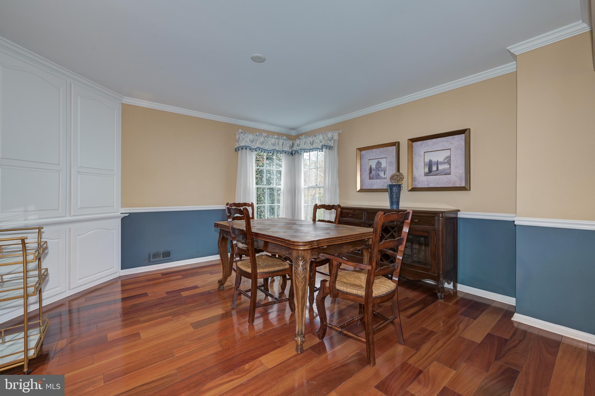 9 Swift Court Medford, NJ 08055 - Photo 11 of 54 a view of a dining room with furniture and wooden floor
