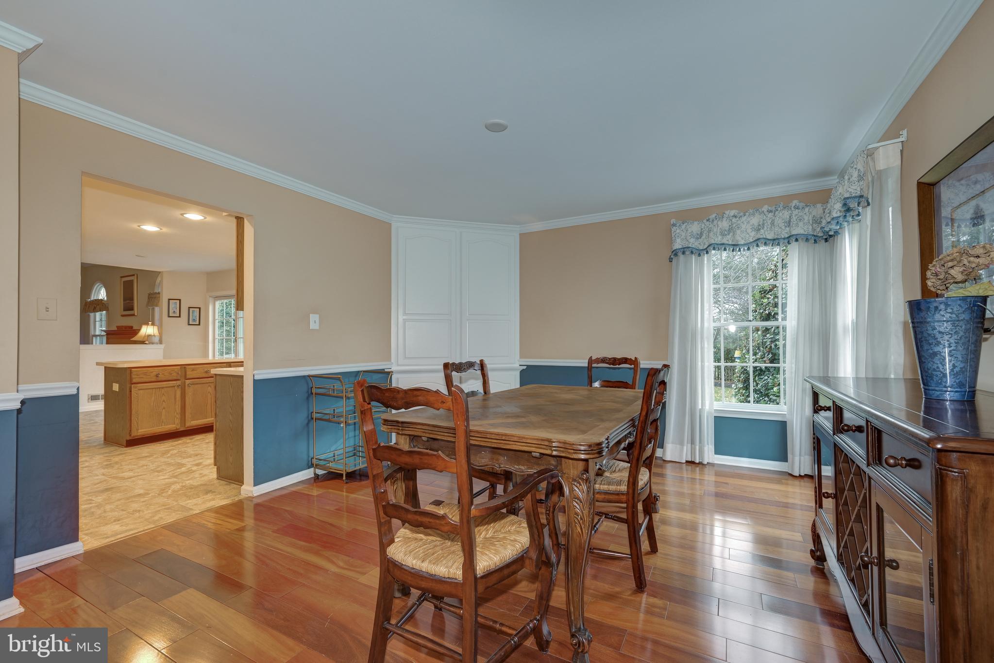 9 Swift Court Medford, NJ 08055 - Photo 12 of 54 a view of a dining room with furniture and a window