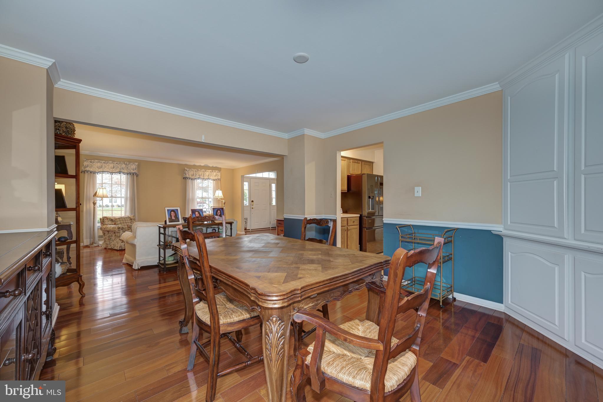 9 Swift Court Medford, NJ 08055 - Photo 13 of 54 a view of a dining room with furniture and wooden floor