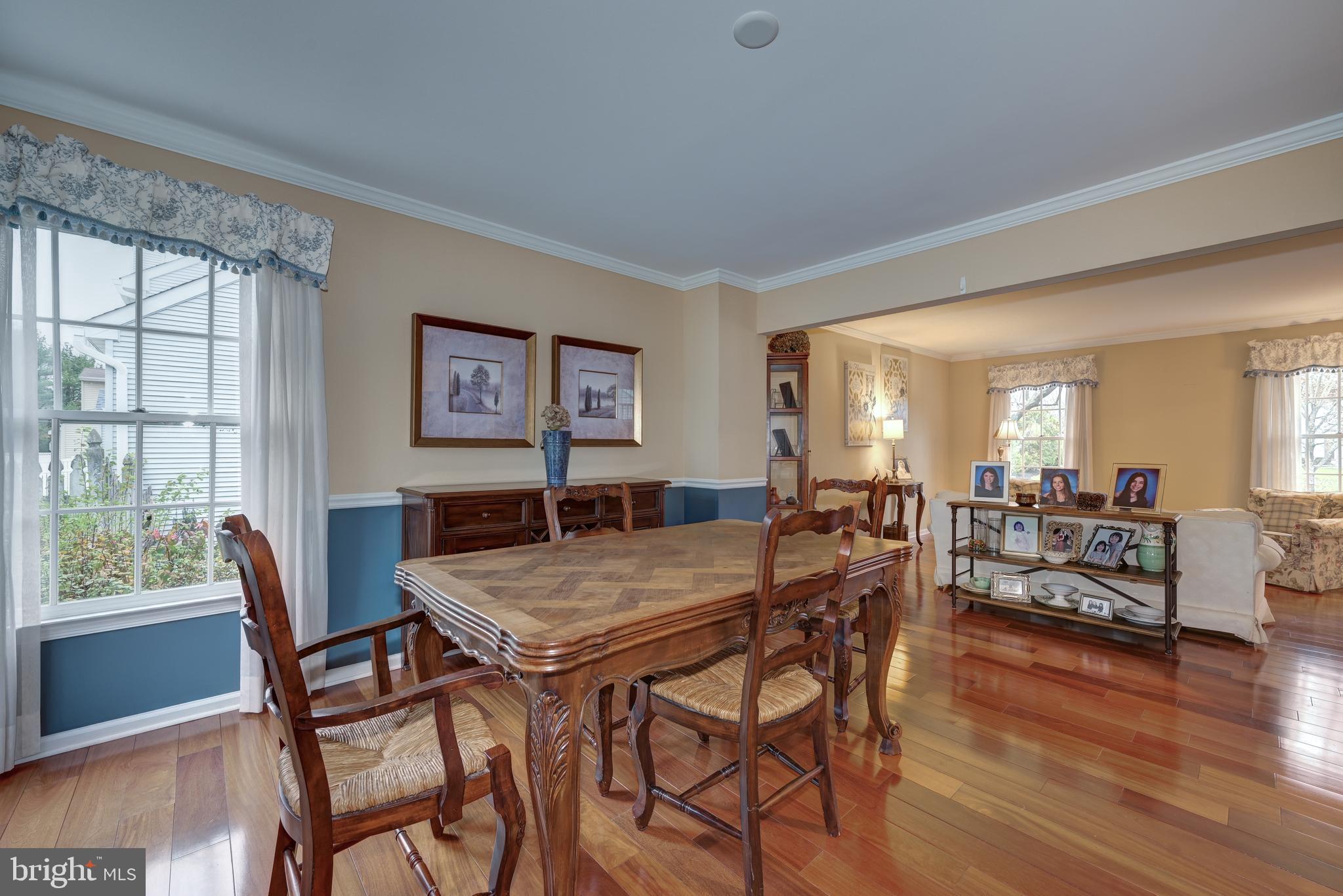 9 Swift Court Medford, NJ 08055 - Photo 14 of 54 a view of a dining room with furniture window and wooden floor