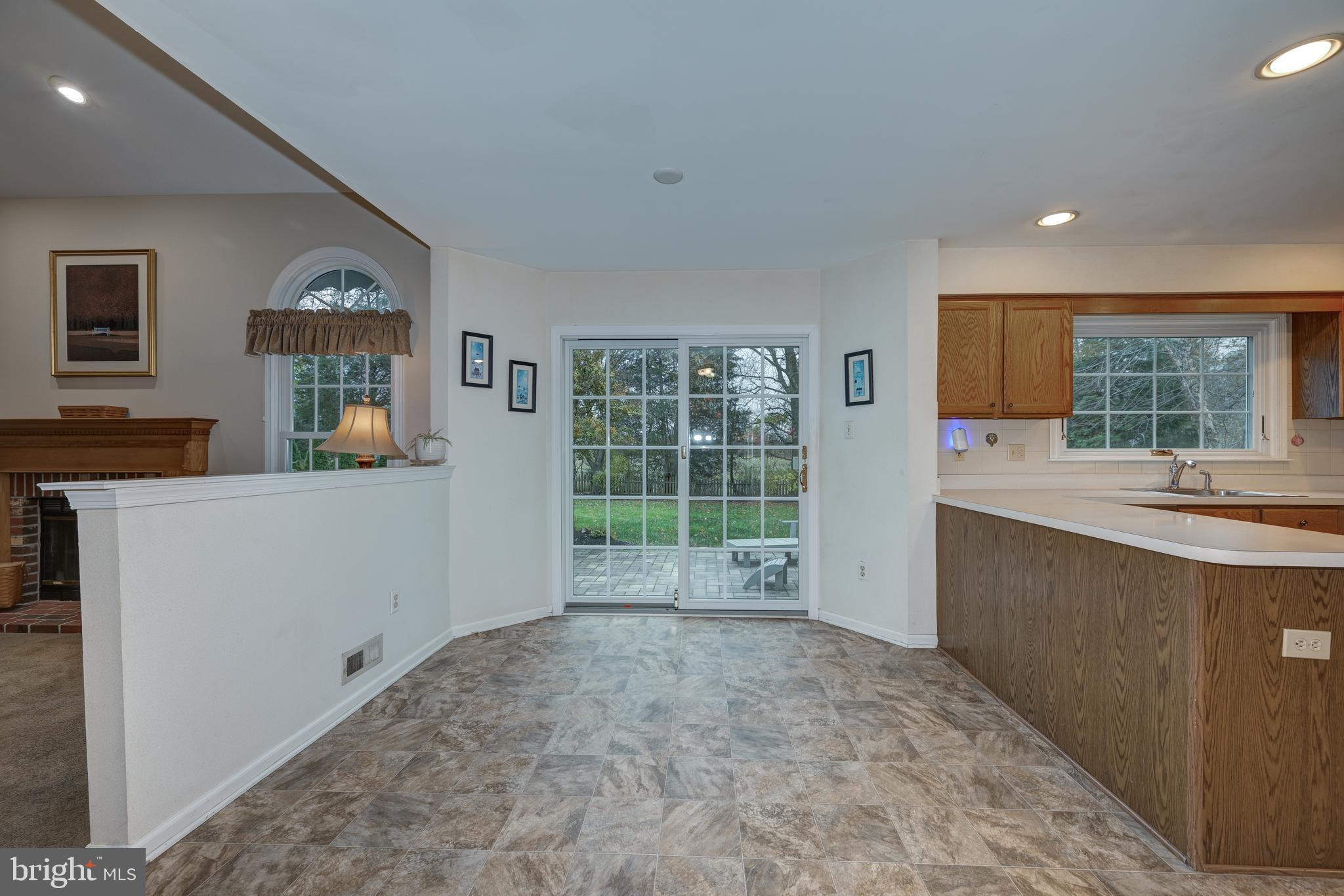 9 Swift Court Medford, NJ 08055 - Photo 19 of 54 a view of a kitchen with a sink and a large window