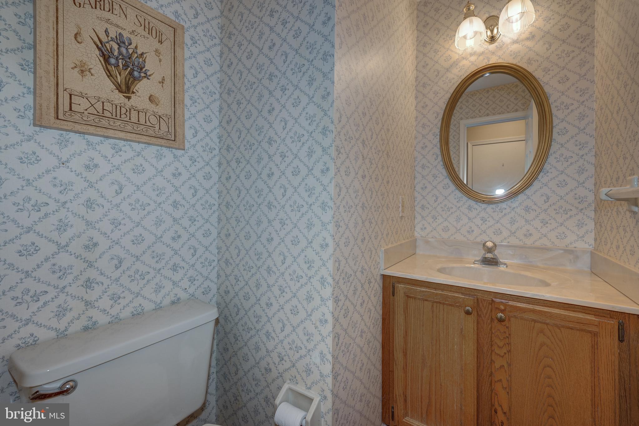 9 Swift Court Medford, NJ 08055 - Photo 25 of 54 a bathroom with a toilet and a sink