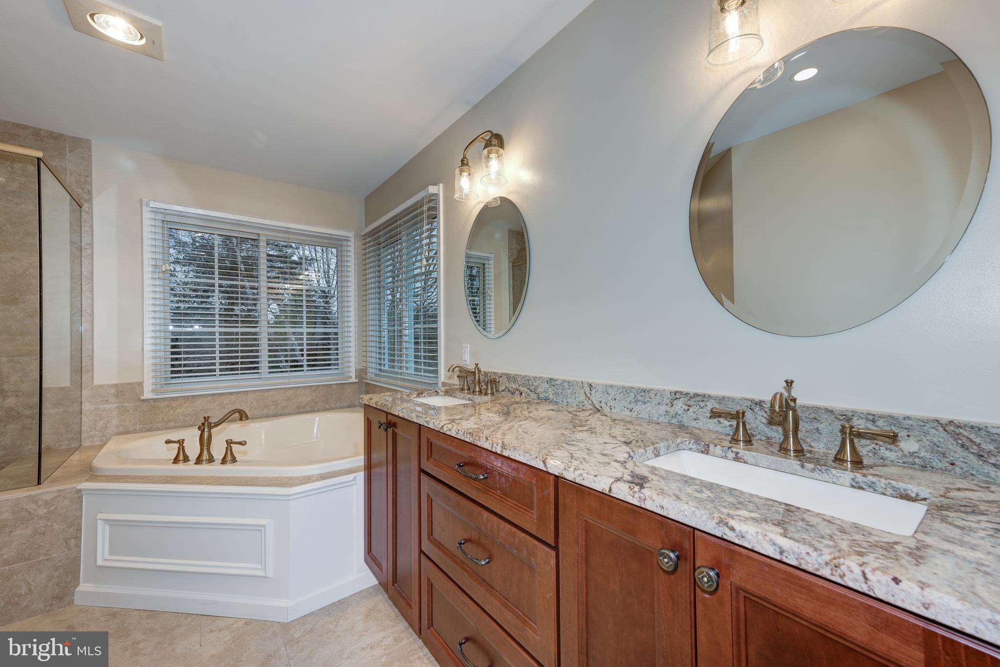 9 Swift Court Medford, NJ 08055 - Photo 29 of 54 a bathroom with a granite countertop double vanity sink and a mirror