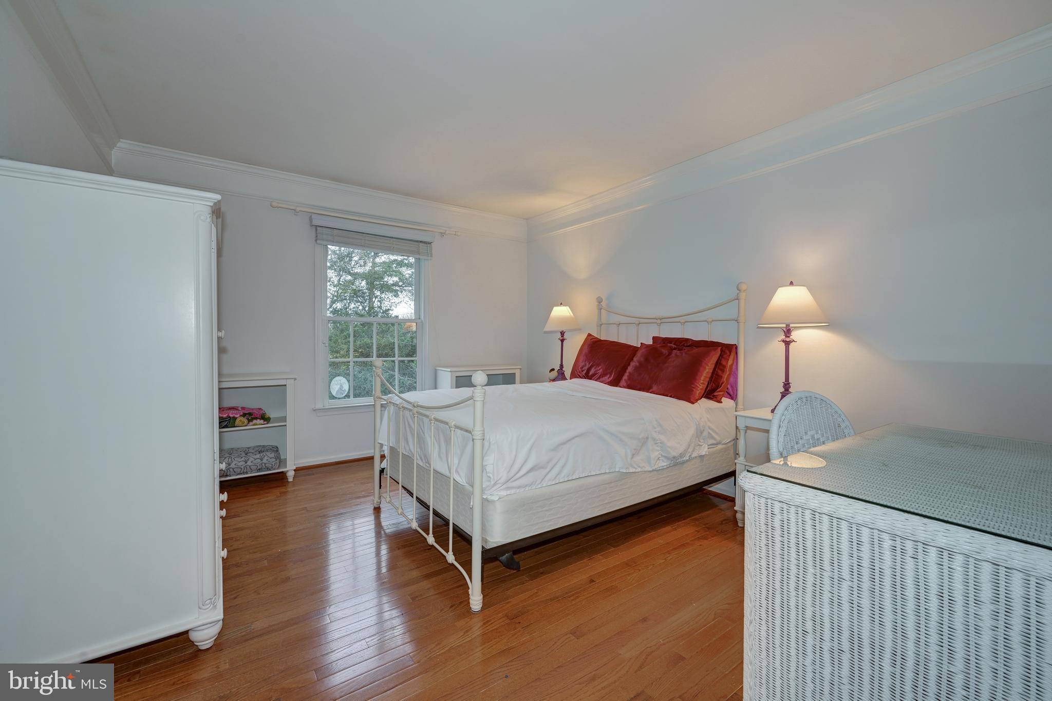 9 Swift Court Medford, NJ 08055 - Photo 32 of 54 a bedroom with a bed and a night stand