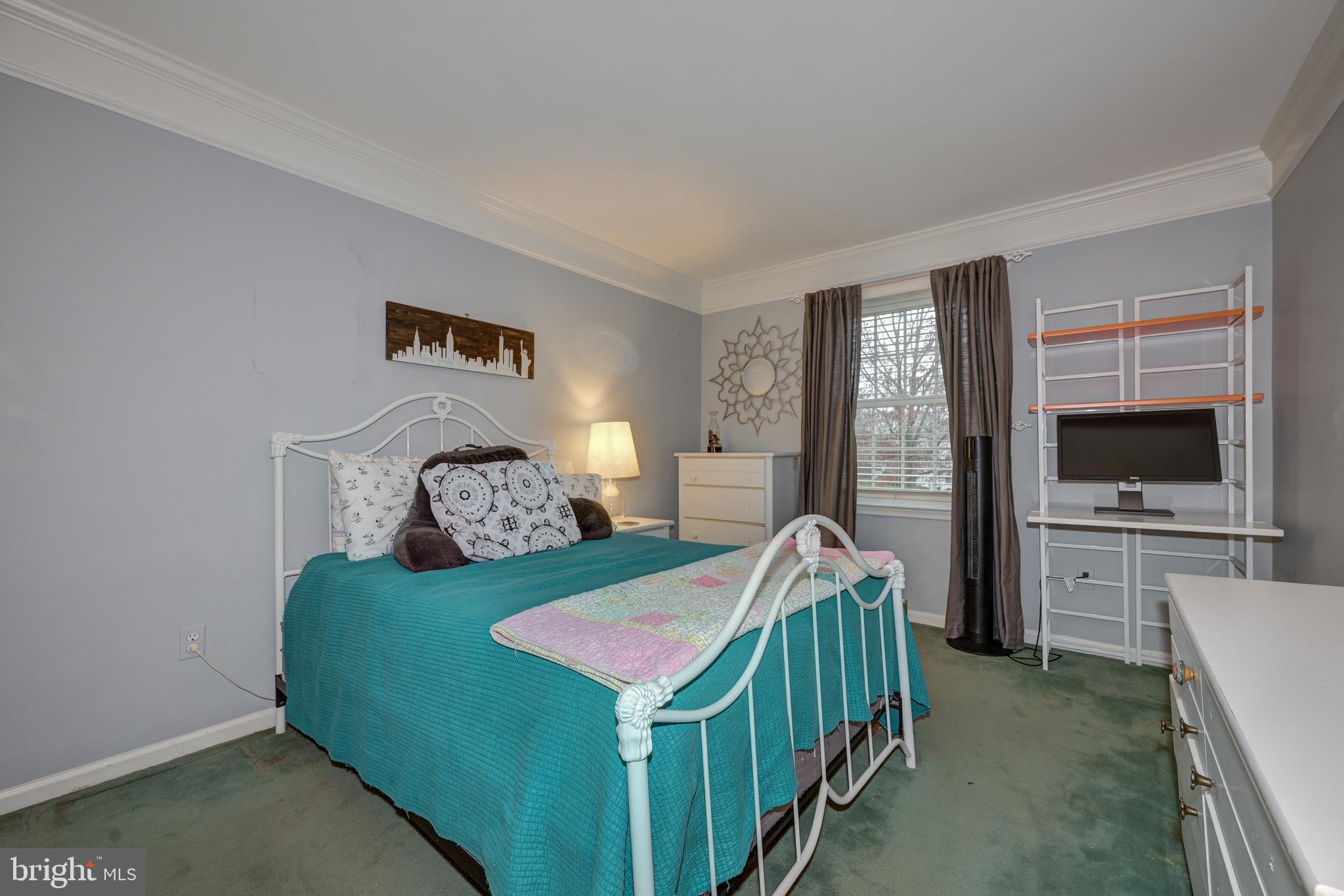 9 Swift Court Medford, NJ 08055 - Photo 35 of 54 a bedroom with a bed and a flat screen tv