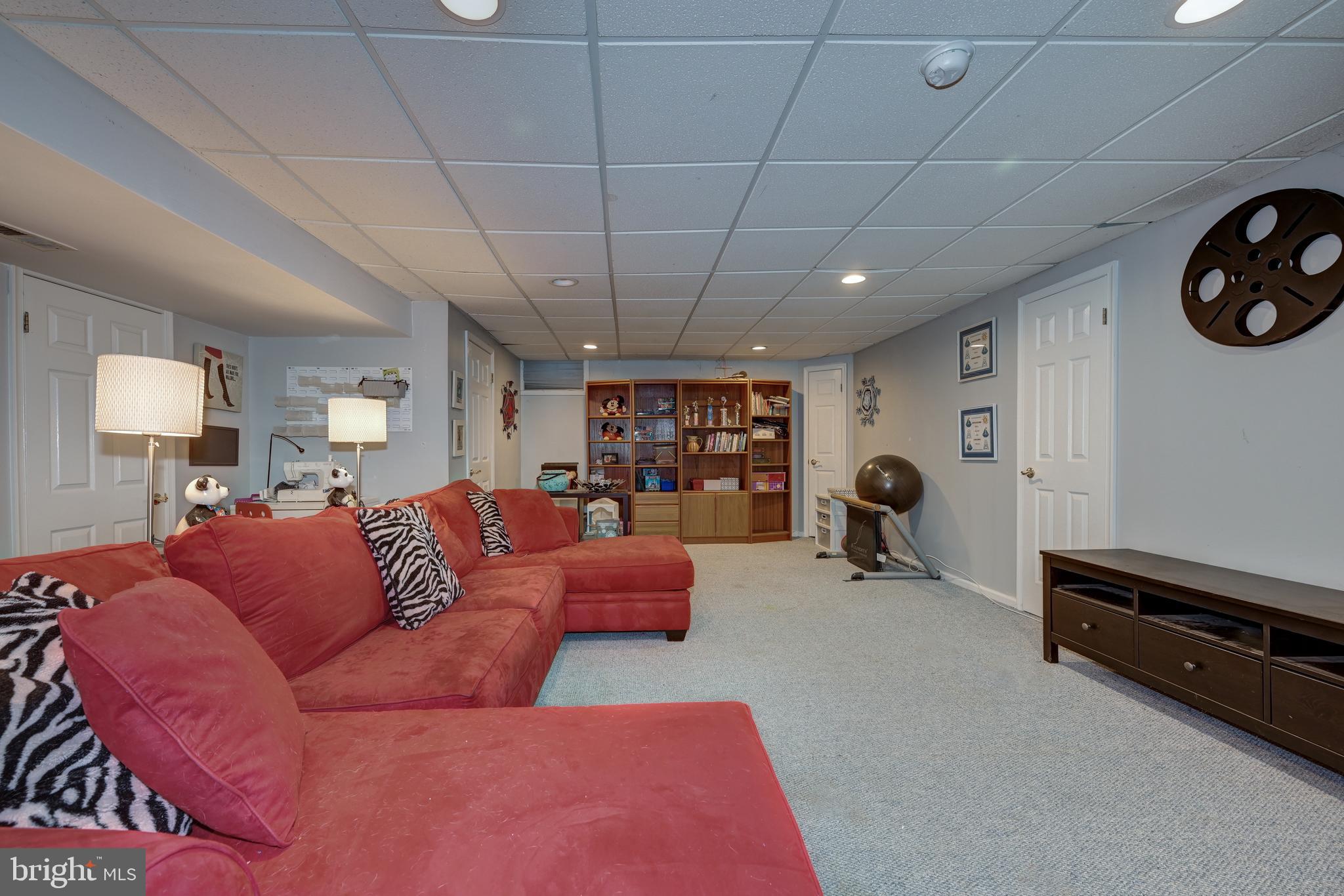 9 Swift Court Medford, NJ 08055 - Photo 38 of 54 a projector room with furniture and a window