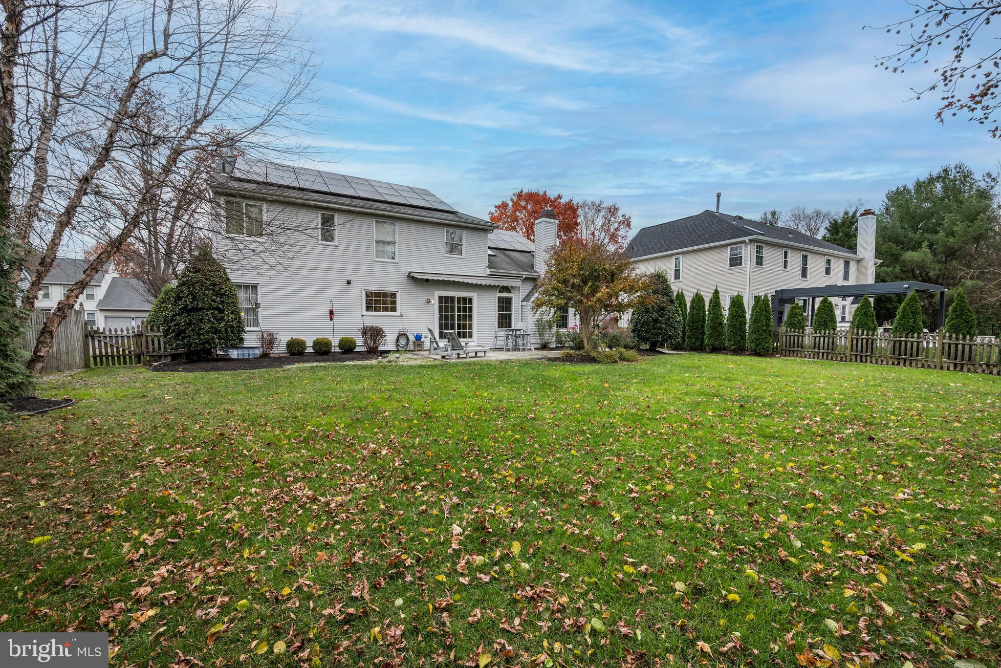 9 Swift Court Medford, NJ 08055 - Photo 39 of 54 a view of a white house with a big yard and large trees