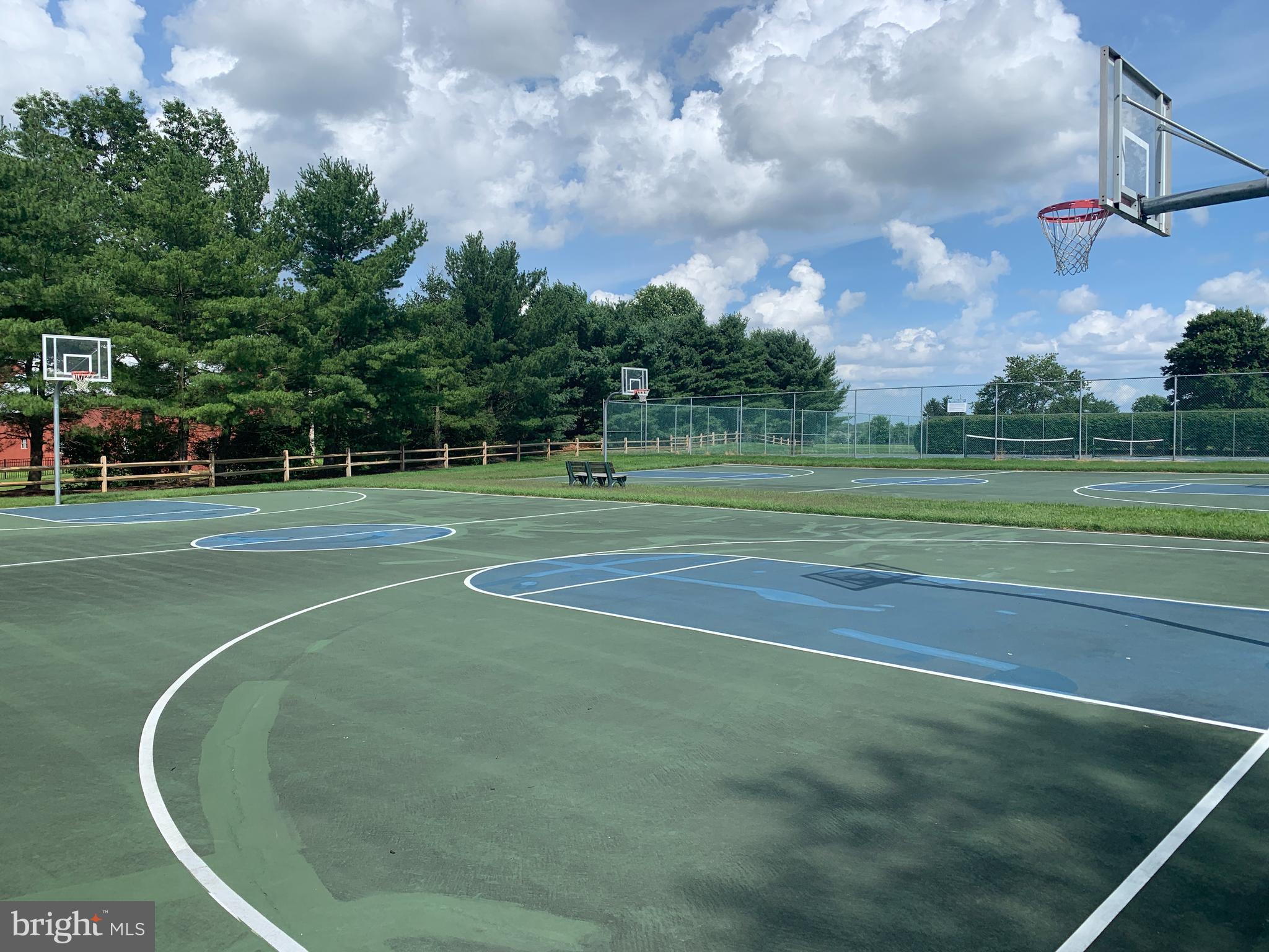 9 Swift Court Medford, NJ 08055 - Photo 52 of 54 a view of a tennis ground with large trees