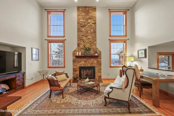 a large kitchen with stainless steel appliances and a large kitchen