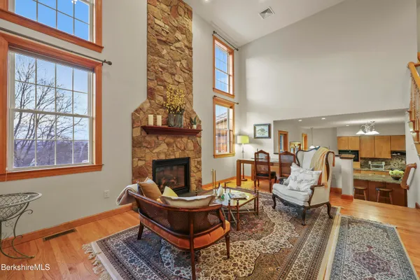 a kitchen with granite countertop a sink and cabinets