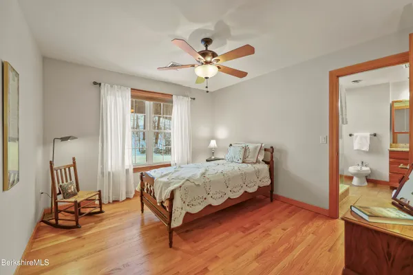 a view of a house with backyard porch and sitting area