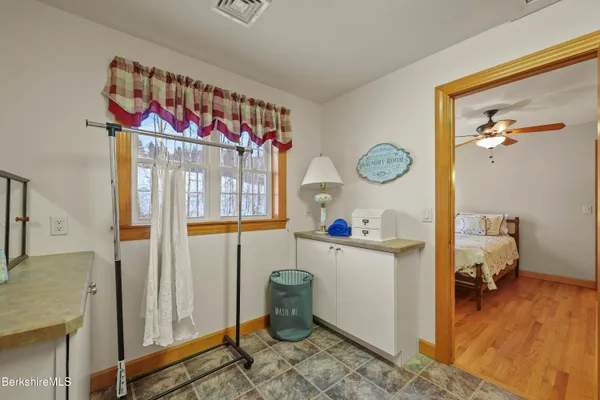 a backyard of a house with outdoor seating