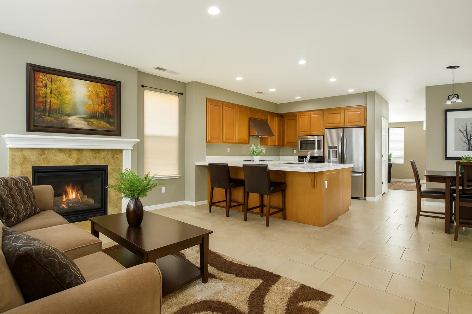 10148 Tony Court Stockton, CA 95209 - Photo 2 of 12 a living room with furniture and a fireplace