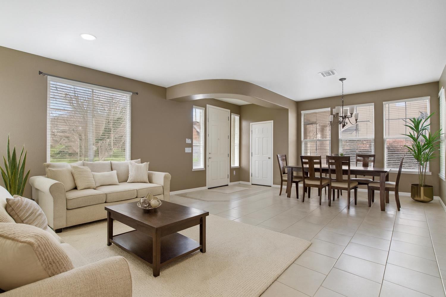 10148 Tony Court Stockton, CA 95209 - Photo 5 of 12 a living room with furniture and a large window