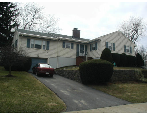 21 Pickman Road Salem, MA 01970 - Photo 1 of 1 a house that has a lot of windows and plants