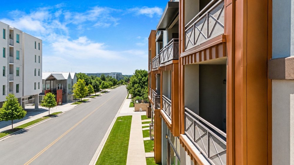 2827 Manor Road, Unit 2201 Austin, TX 78722 - Photo 39 of 40 Contemporary building exterior featuring private balconies with decorative railings