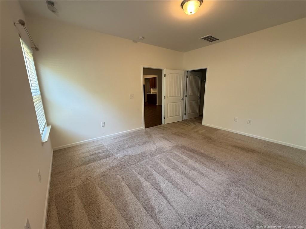 240 Planters Lane Coats, NC 27521 - Photo 13 of 18 a view of an empty room