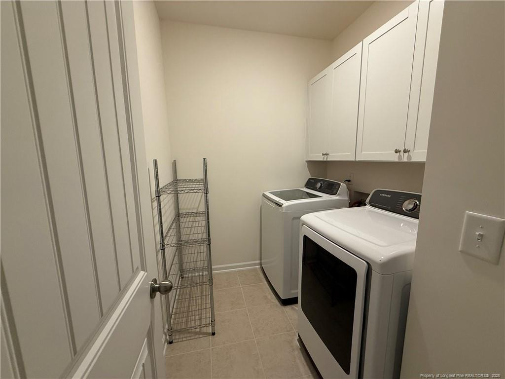 240 Planters Lane Coats, NC 27521 - Photo 8 of 18 a utility room with dryer and washer