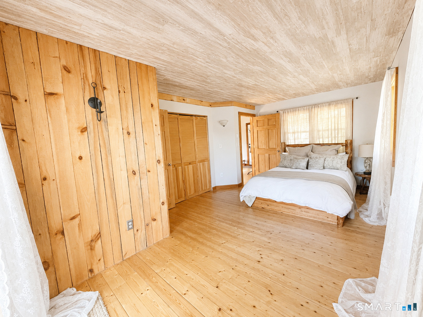 74 Cove Road, Unit 17 Haddam, CT 06424 - Photo 9 of 39 a spacious bedroom with a bed and a window