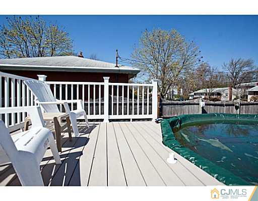 1982 Oak Tree Road Edison, NJ 08820 - Photo 20 of 25 a view of backyard with deck and outdoor seating