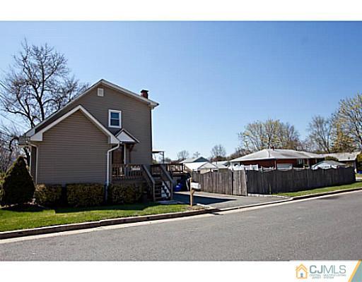 1982 Oak Tree Road Edison, NJ 08820 - Photo 24 of 25 a view of a street with a house in the background