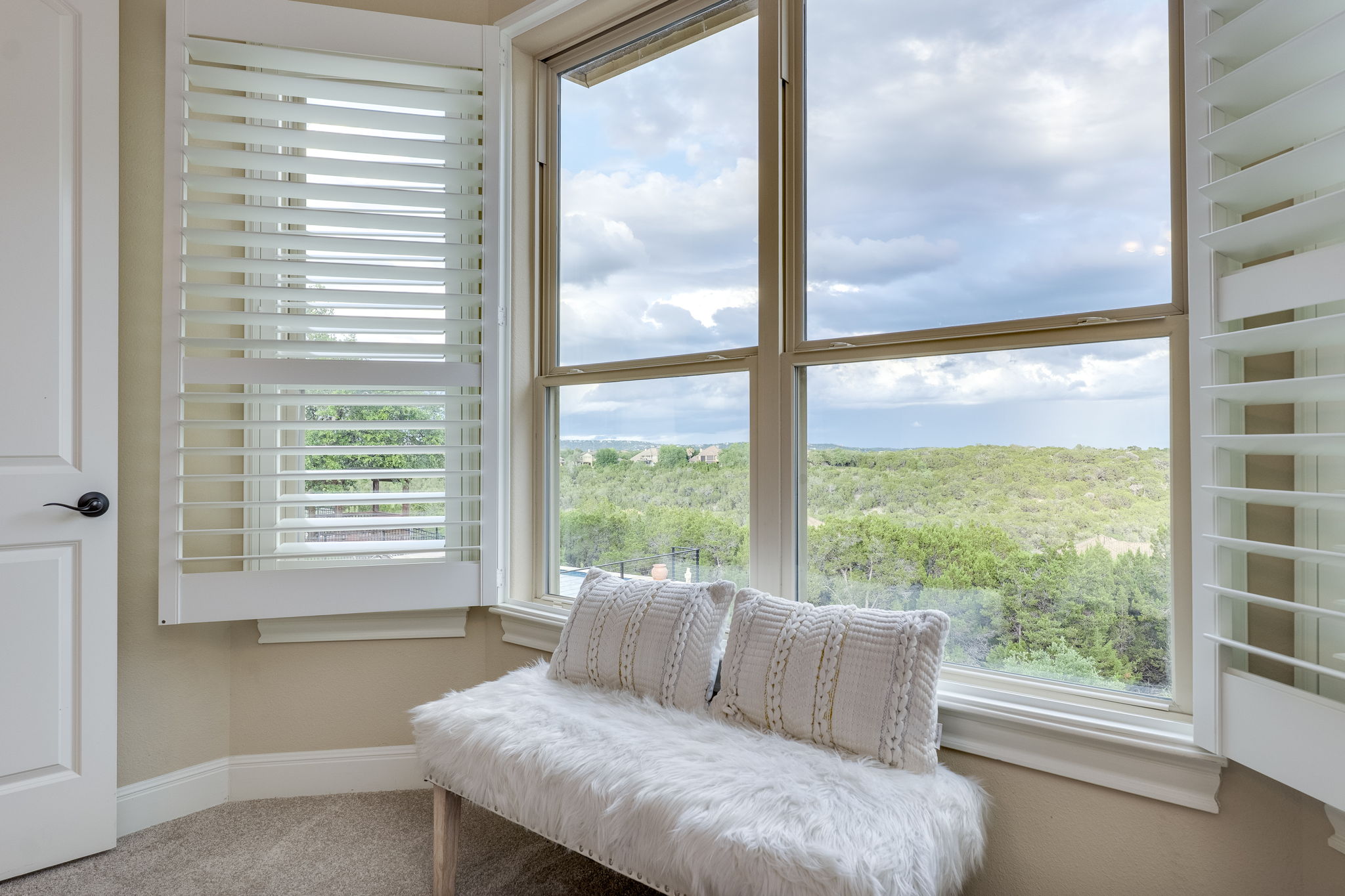 11601 Shadestone Terrace Austin, TX 78732 - Photo 29 of 40 a living room with furniture and a window