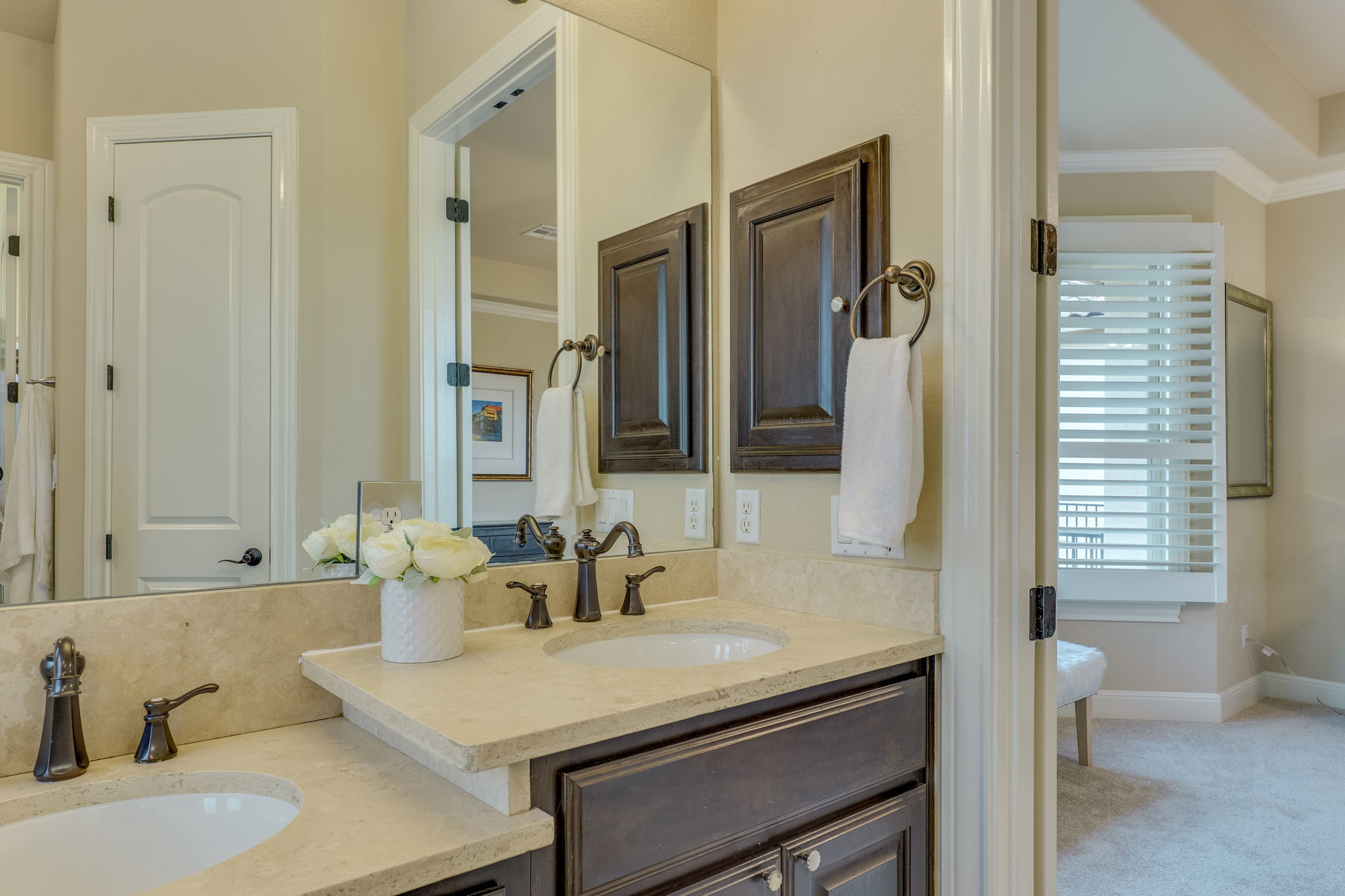 11601 Shadestone Terrace Austin, TX 78732 - Photo 33 of 40 a bathroom with a sink and a mirror