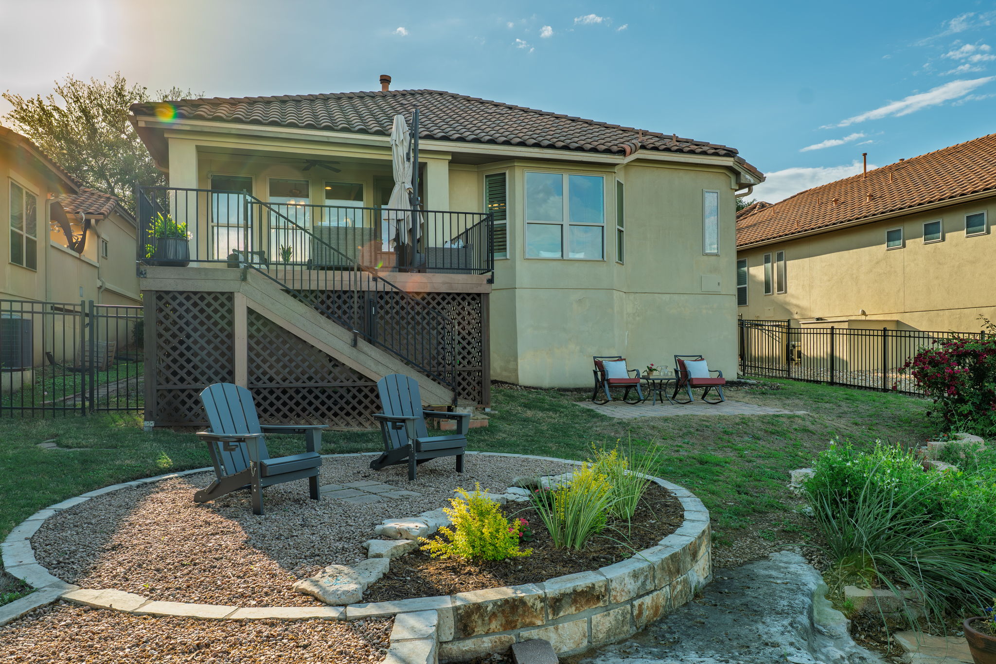 11601 Shadestone Terrace Austin, TX 78732 - Photo 40 of 40 a view of a chair and table in backyard of the house