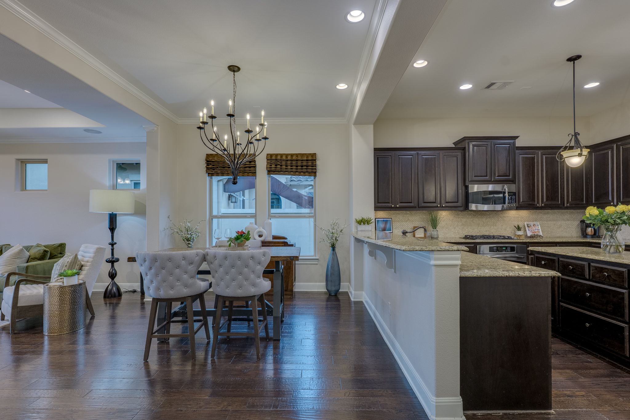 11601 Shadestone Terrace Austin, TX 78732 - Photo 9 of 40 a view of a dining room with furniture window and wooden floor