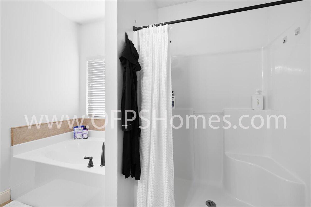 4632 Hermosa Road Crestview, FL 32539 - Photo 11 of 35 a bathroom with a shower and a sink