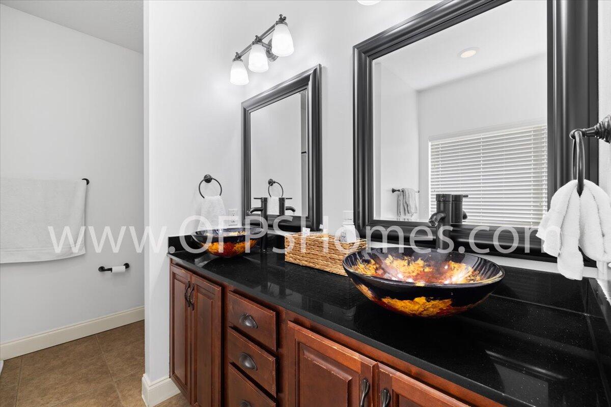 4632 Hermosa Road Crestview, FL 32539 - Photo 12 of 35 a close view of sink and mirror