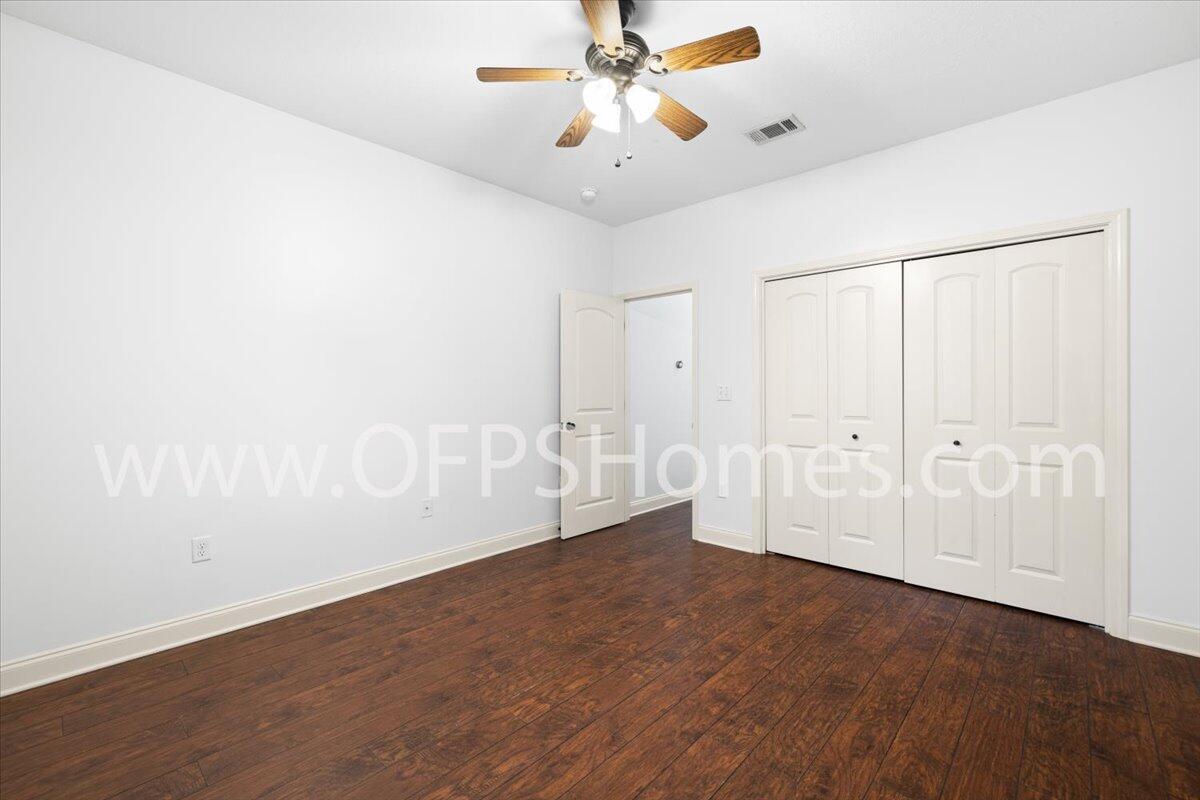 4632 Hermosa Road Crestview, FL 32539 - Photo 20 of 35 wooden floor in an empty room