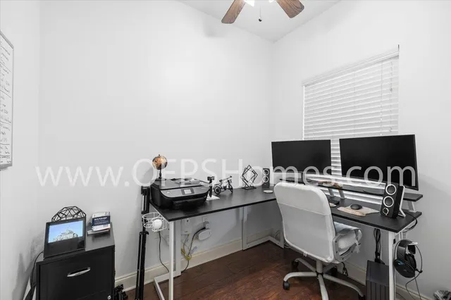 a view of a workspace with furniture