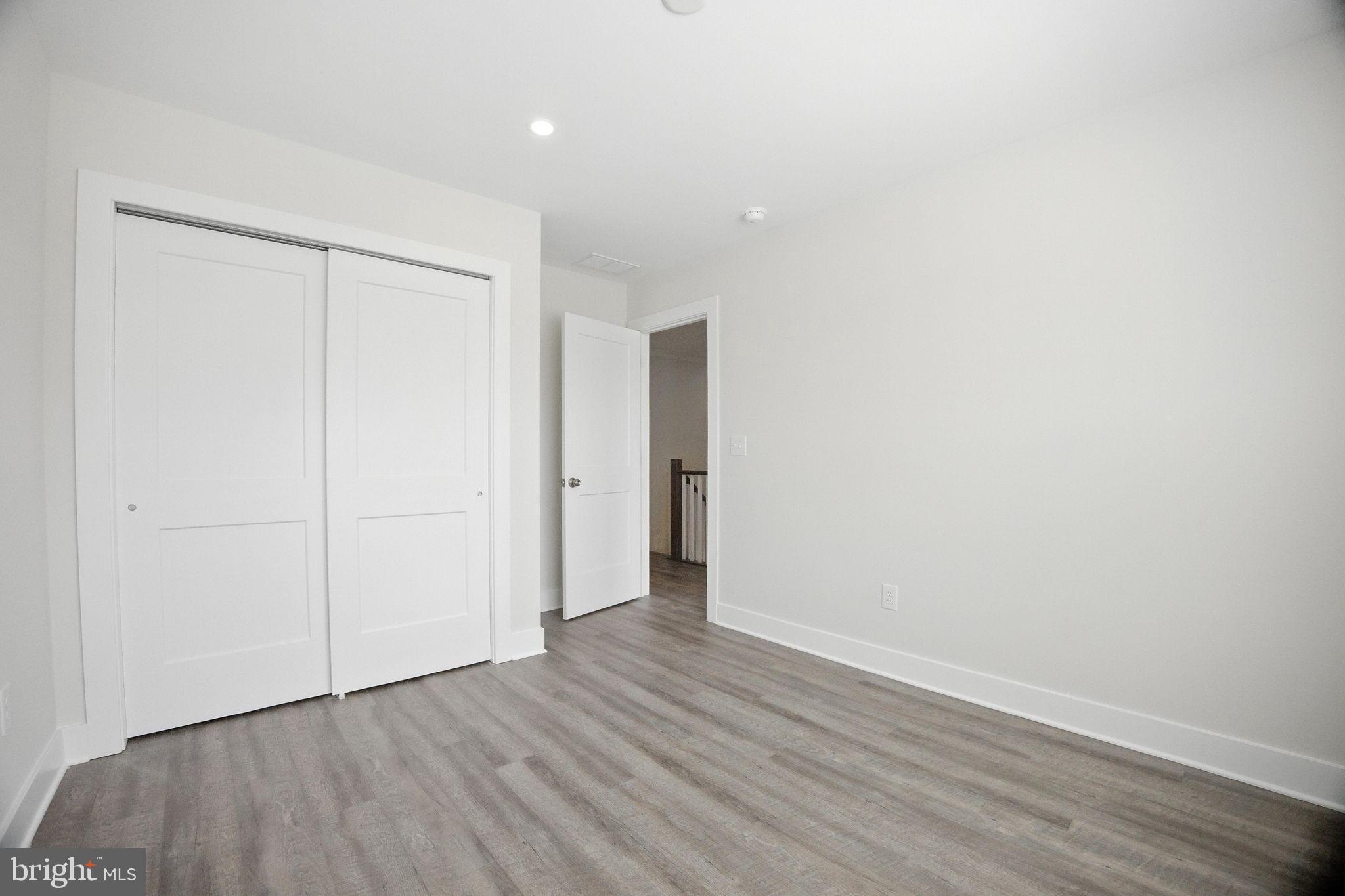43 Sequoia Drive Berlin, NJ 08009 - Photo 23 of 40 a view of an empty room with wooden floor