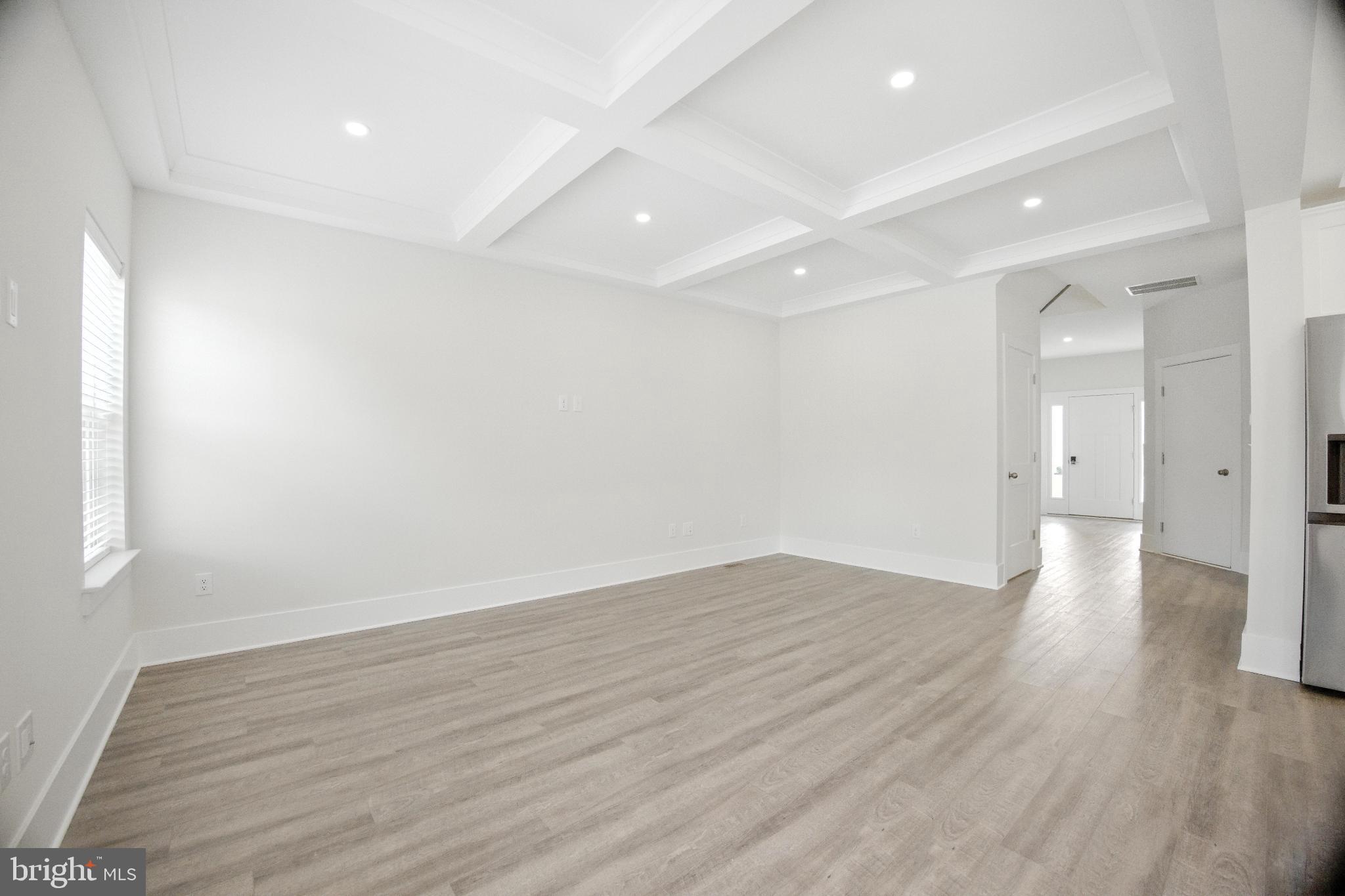 43 Sequoia Drive Berlin, NJ 08009 - Photo 28 of 40 an empty room with wooden floor and windows