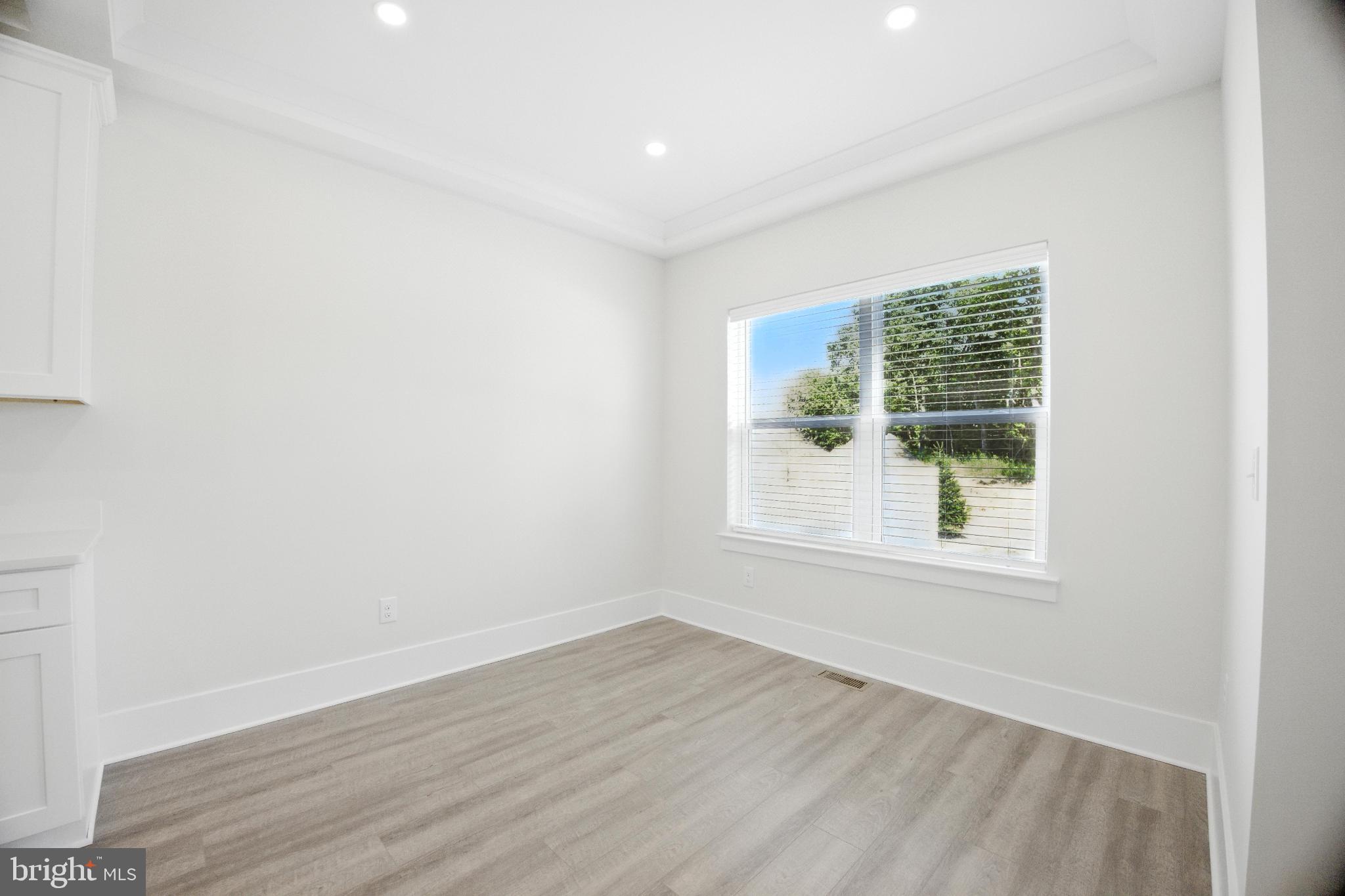 43 Sequoia Drive Berlin, NJ 08009 - Photo 29 of 40 an empty room with wooden floor and windows