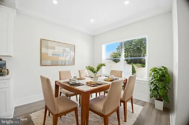 a bedroom with a bed lamp and window