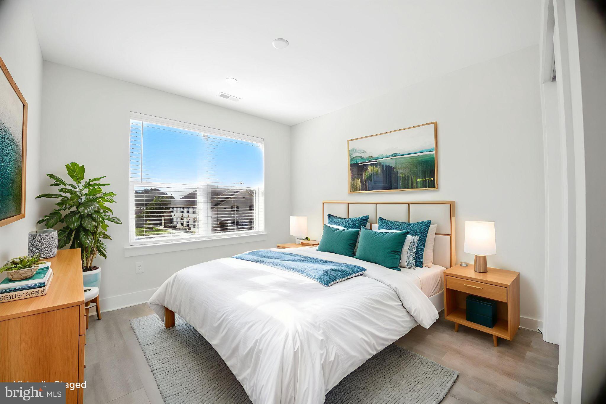 43 Sequoia Drive Berlin, NJ 08009 - Photo 35 of 40 a bedroom with a bed and a potted plant