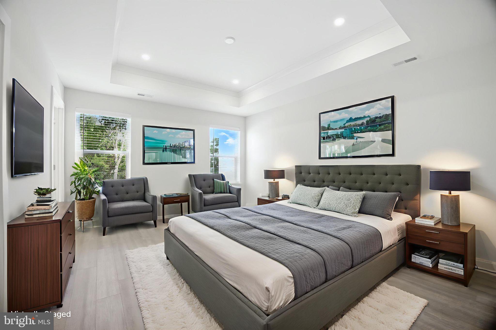 43 Sequoia Drive Berlin, NJ 08009 - Photo 38 of 40 a bedroom with a large bed and a flat screen tv