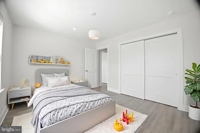 a bedroom with furniture and a bed