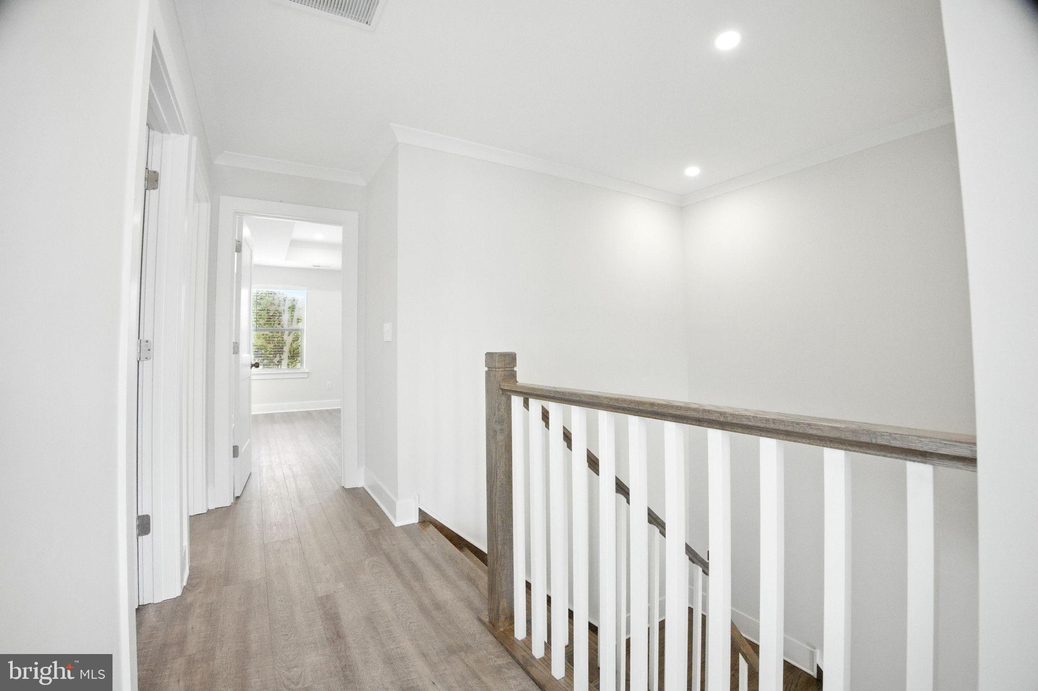 43 Sequoia Drive Berlin, NJ 08009 - Photo 5 of 40 a view of a hallway with wooden floor